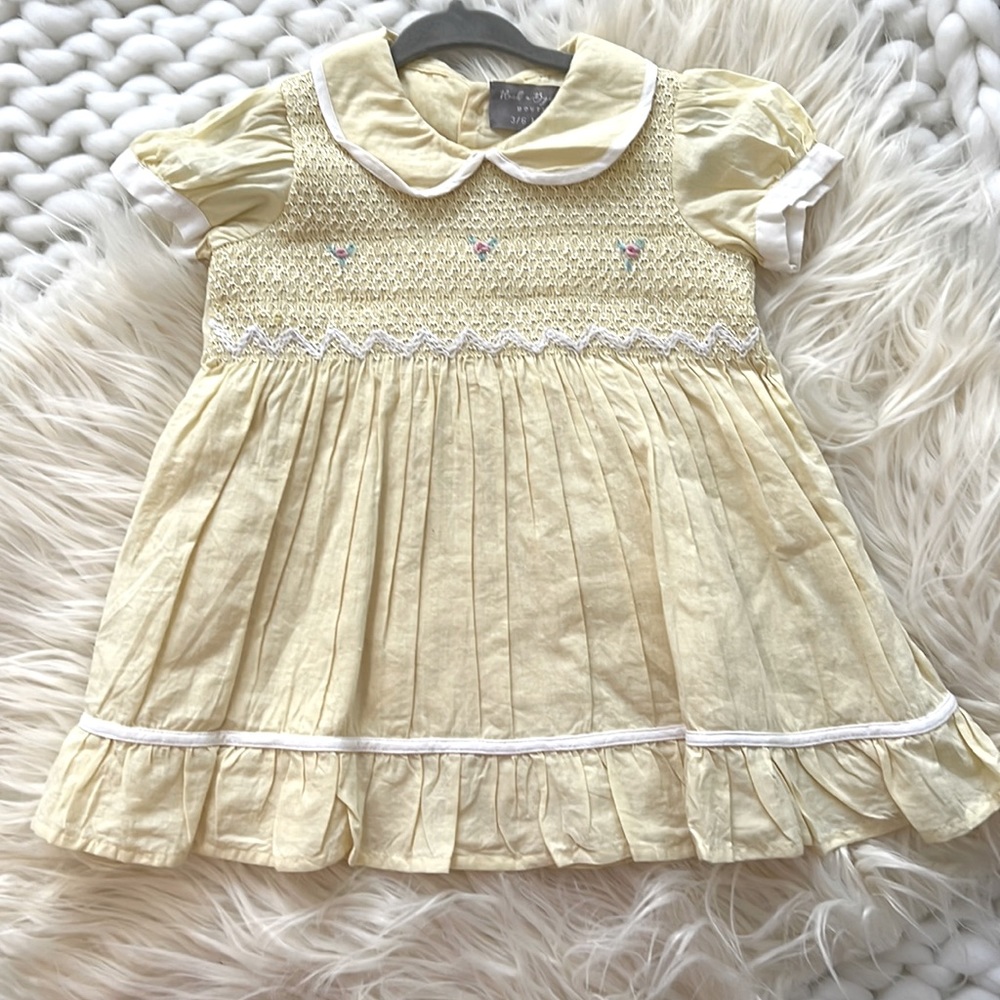 Baby girl size 3/6 months, yellow smocked boutique dress with ruffle bloomers.